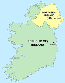 a map showing the outline of Ireland in the colour green with the capitals of the North and South marked on it