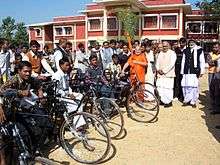 Rambhadracharya with mobility-impaired students