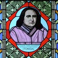 A man with shoulder-length black hair, wearing a lilac tunic, is shown in a colored glass window. In the glass beneath the picture is his name and the phrase "1st Bishop of Central Oceania (Tonga)"