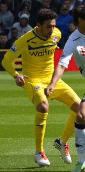 Jem Karacan playing for Reading in 2013.