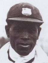 A man in a West Indies cricket cap