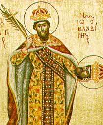Religious painting of a man wearing a crown, a cloak, and a robe with floral designs, holding a cross, a scepter, and a leafed branch in his right hand, and a severed human head in his left hand.