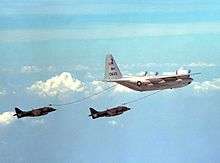 Harriers flying behind a tanker aircraft