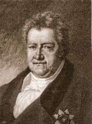 Black and white print of a man with a double-chin wearing a dark coat with a decoration on the breast.