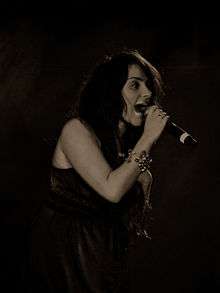 Black and White image of Laura White singing