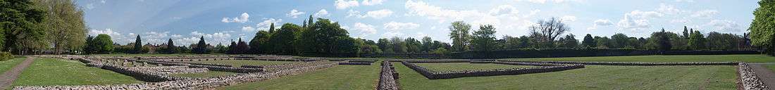 a contemporary panoramic photograph of the abbey's ruins