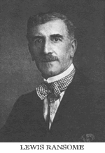 Head shot of a middle-aged man with moustache and bow tie.