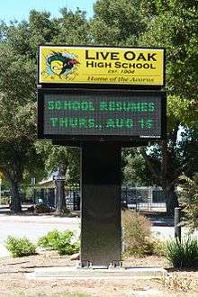 Electronic signboard on East Main Avenue in front of Live Oak High School