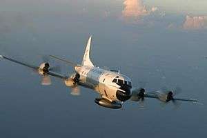 A WP-3D Orion weather reconnaissance aircraft in flight.
