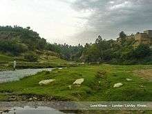 View of pasture and stream in Lund Khwar.