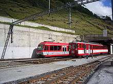 Contrasting railcars at Zermatt station.