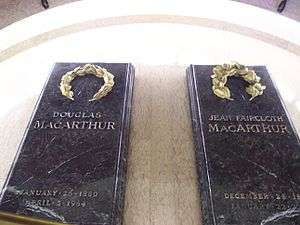 Two black granite slabs inscribed with the names "Douglas MacArthur" and "Jean Faircloth MacArthur"