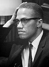 Malcolm X before a 1964 press conference