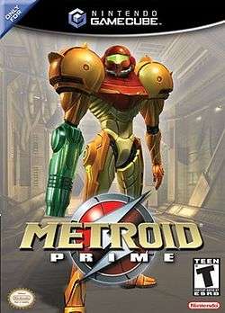 A person in a big, futuristic-looking powered suit with a helmet, a firearm on the right arm and large, bulky, and rounded shoulders, stands on an industrial-like corridor. Atop the image is the Nintendo GameCube logo, and the text "Only for" in the upper left corner. In the bottom of the image, the title "Metroid Prime" in front of an insignia with a stylized "S", the Official Nintendo Seal of Quality, Nintendo's logo, and ESRB's rating of "T".