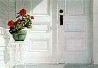  striking photo-realistic  oil painting of white porch with double-doors, geranium plant on white stand