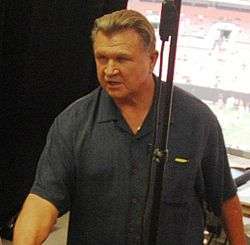Mike Ditka in the press booth of a pre-season football game