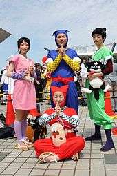 Four people in costume