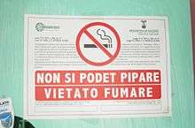 Sign with graphic of crossed-out cigarette
