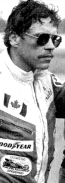 Image of Norris McDonald wearing auto racing gear