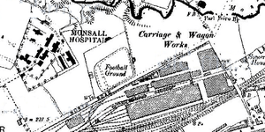Map showing a four-sided "Football Ground". The sides face diagonally, are slightly rounded, and are surrounded by "North Road" (in all capitals) and a railyard to the southeast, "Monsall Hospital" (all capitals) to the west, and "Carriage & Wagon Works" to the northeast