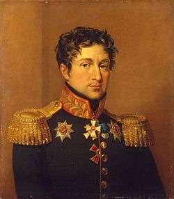 Painting of a somber, clean-shaven man with dark wavy hair. He wears a very dark green military coat with gold epaulettes and several medals.