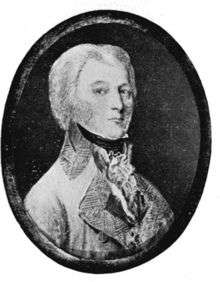 Black and white oval print of a serious young man in a white military coat with wide lapels. His hair comes down to his collar.