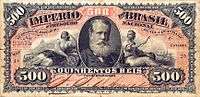 Photograph of a banknote containing a picture of a bearded man in the center and thee number 500 printed in the corners