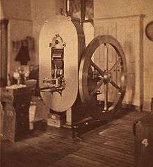 A photograph of a large machine used to strike coins