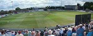 Interior view of the County Ground in Derby with a large number of people in the stands