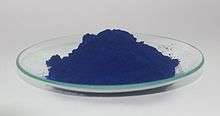 Photo of a dish of deep blue powder