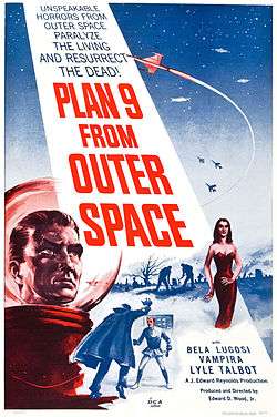 "PLAN 9 FROM OUTER SPACE" in large red letters adorns a beam from a night sky containing spacecraft and warplanes. The foreground has the head of a man in a bubble-headed red spacesuit, a caped vampire attacking a victim, a seductive vampiress and gravediggers at work. Above the title is "UNSPEAKABLE HORRORS FROM OUTER SPACE PARALYZE THE LIVING AND RESURRECT THE DEAD!"; below are "BELA LUGOSI", "VAMPIRA" and "LYLE TALBOT".