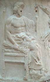 Bas-relief of Jupiter, nude from the waist up and seated on a throne