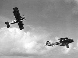Two Royal Air Force biplanes in flight