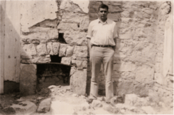 Robert E. Howard in the doorway of a ruined wall