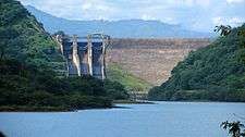 View of the Randenigala Dam and spillways from the Rantembe Reservoir, downstream.