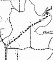 A black-and-white map of several roads on a dull white paper