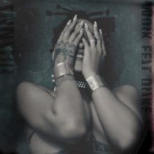 Rihanna covering her face with her hands