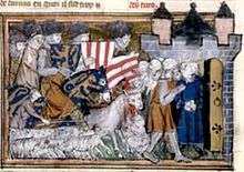 A captive man is taken to the open gate of a fortress; a flock of sheep