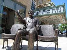 A statue of Roger Ebert outside the Virginia Theater.