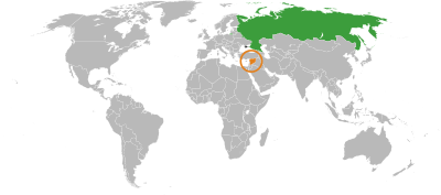 A grey world map with Russia and Syria highlighted