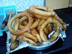 Sail roti nepali cuisine- Kind of sweet chappati fried in oil- 2013-08-10 00-31.jpg