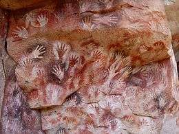 Indigenous cave artwork depicting hands.