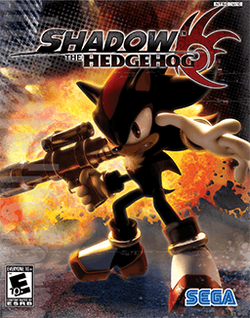 The game's cover art. An anthropomorphic black hedgehog with spiky hair holds a handgun and other weapons, striking an attacking pose with an unhappy expression on his face. A stylized explosion is visible in the background. The words "Shadow the Hedgehog" adorn the top of the screen, as does a red logo that resembles the hedgehog's head.