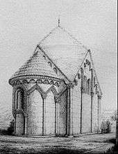 A small squat Romanesque chapel