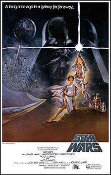 Film poster showing Luke Skywalker triumphantly holding a lightsaber in the air, Princess Leia sitting beside him, and R2-D2 and C-3PO staring at them. A figure of the head of Darth Vader and the Death Star with several starships heading towards it are shown in the background. Atop the image is the text "A long time ago in a galaxy far, far away..." Below is shown the film's logo, above the credits and the production details.