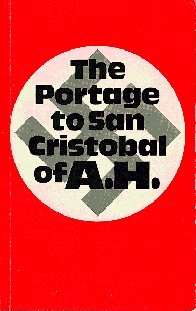 First edition cover of The Portage to San Cristobal of A.H. showing a grey Nazi swastika in a white circle on a red background; the book title appears in black over the swastika