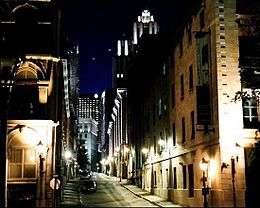 Narrow Montreal street at night