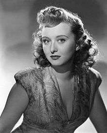 Black-and-white publicity photo of Celeste Holm .