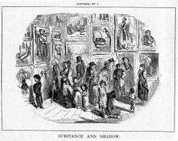 A detailed black-and-white illustration is vignetted in the center showing people of various sizes looking at pictures framed on the left and back walls.