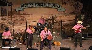 Lesa Cormier and the Sundown Playboys at the Liberty Theater in 2003.  All members are wearing pink.
